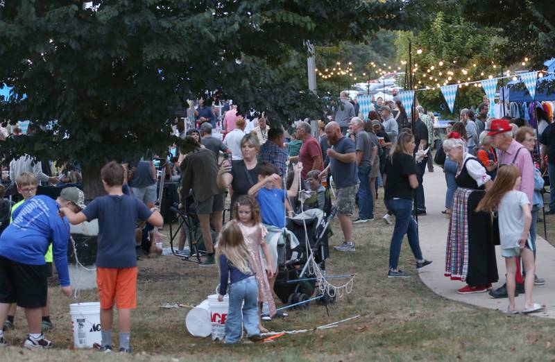 People gather for the Oktoberfest event on Saturday, Oct. 18, 2025 at Rotary Park in Princeton.