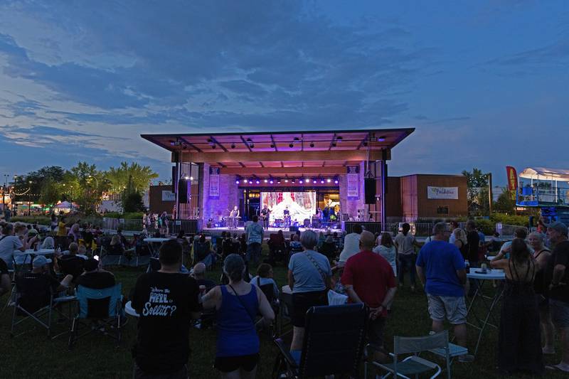 Music fans and festivalgoers fill The Grove in Bourbonnais for The Anthem Band's Styx tribute show during the Bourbonnais Friendship Festival on Thursday, June 26, 2025.