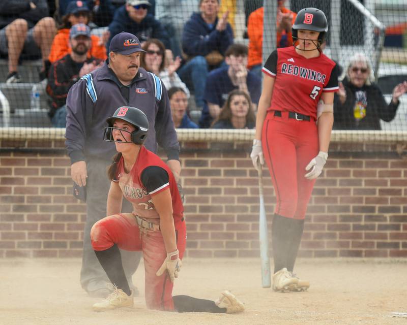 Benet Academy's Sophia Rosner (21) reacts after being called out at home plate while taking on Oswego during the regional final game on Friday May 22, 2026, held at Oswego High School.