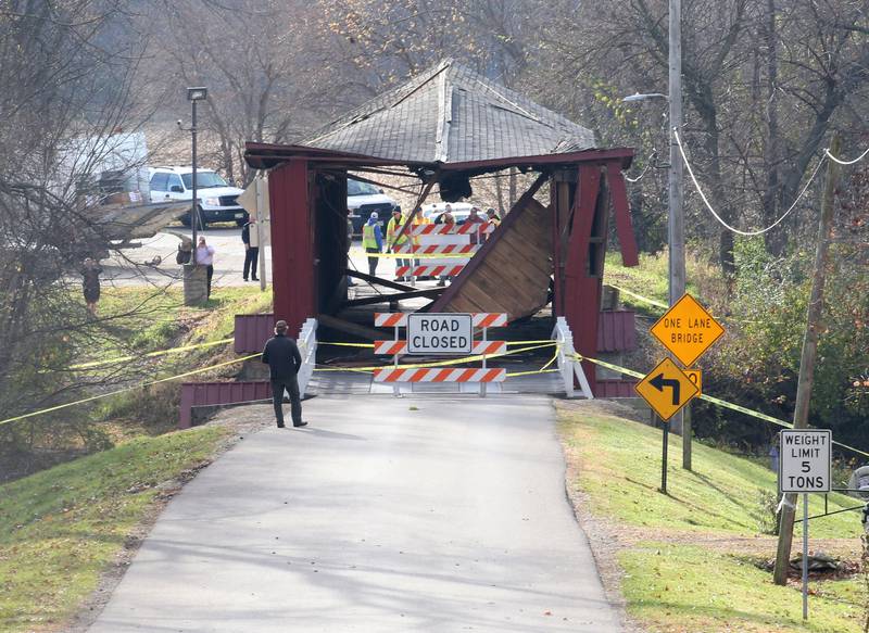 A view of the damage looking south at the Red Covered Bridge on Thursday, Nov. 16, 2023 in Princeton. Illinois Department of Transportation, Illinois State Police and Bureau County law enforcement surveyed the damage bridge after it was struck by a semi-truck.