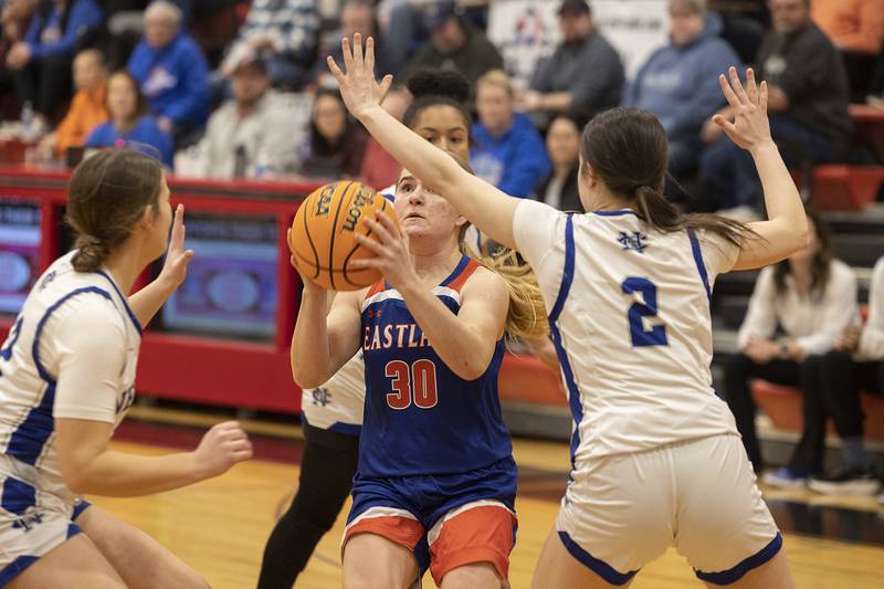 Eastland’s Morgan McCullough puts up a shot against Newman Tuesday, Feb. 18, 2025, during the Class 1A girls basketball regional at Forreston.