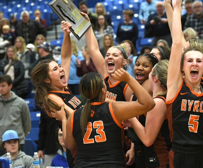 Byron's Ava Kultgen (22) and Ella Grundstrom (Byron's Ava Kultgen (22) and Ella Grundstrom (13) host the super sectional trophy as they celebrate with Mikalah Freedlund (23), Malia Morton (21) Karsyn Bielskis (12) and Sydney Smith (5) after beating DePaul College Prep 52-45 on Monday, Feb. 27.13) host the super sectional trophy as they celebrate with Mikalah Freedlund (23), Malia Morton (21) Brittyn Bielskis (11) and Sydney Smith (5) after beating DePaul College Prep 52-45 on Monday, Feb. 27.