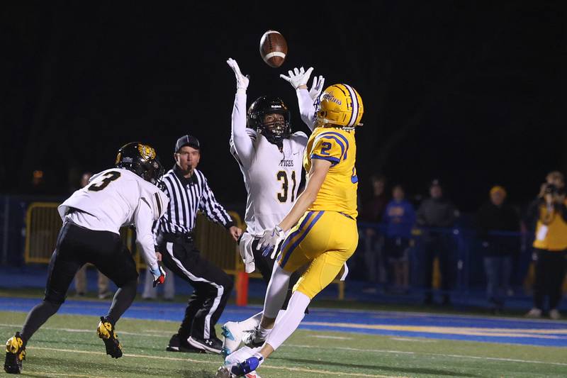 Joliet West’s Thomas Jones nearly gets an interception against Lyons Township in the first round of the playoffs on Friday, Nov. 1, 2024 in La Grange.