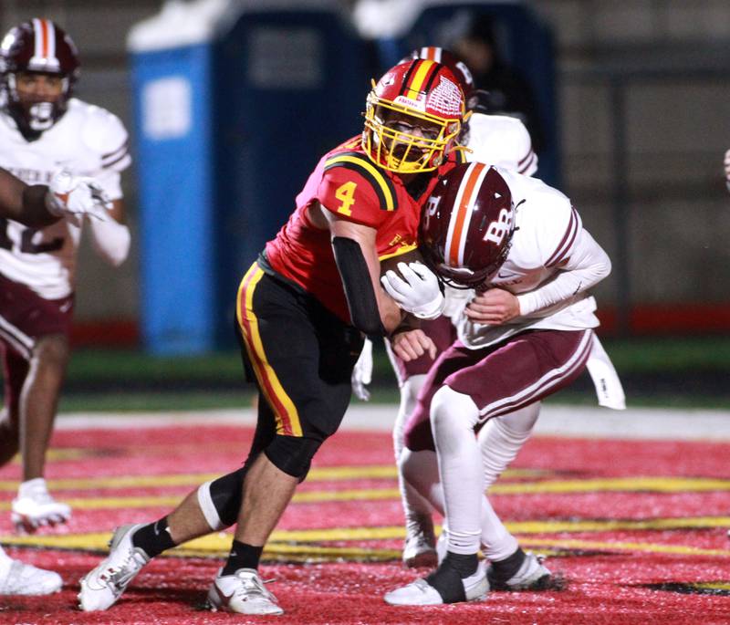 Batavia’s Charlie Whelpley (left) scores a touchdown during a Class 7A round 1 playoff game against Brother Rice in Batavia on Friday, Oct. 27, 2023.