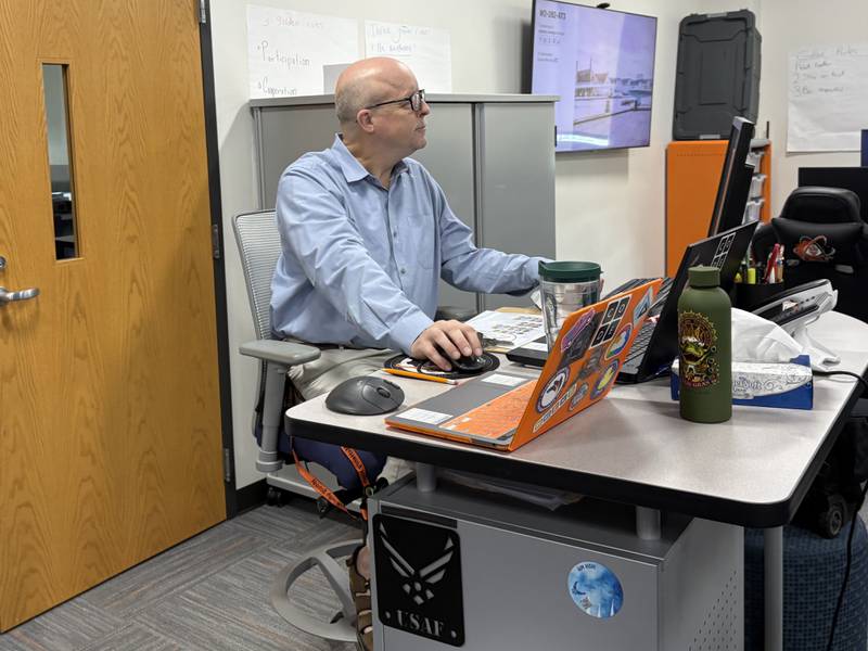 McHenry High School teacher Tim Kirk works on his computer Sept. 23, 2025 at the high school.
