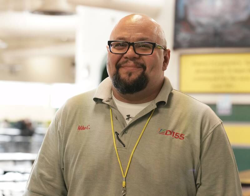 Mike Cruz, a custodian at Crystal Lake South High School, will be recognized Tuesday, March 15, 2022, at a Community High School District 155 for successfully performing the Heimlich maneuver on a choking student last month.