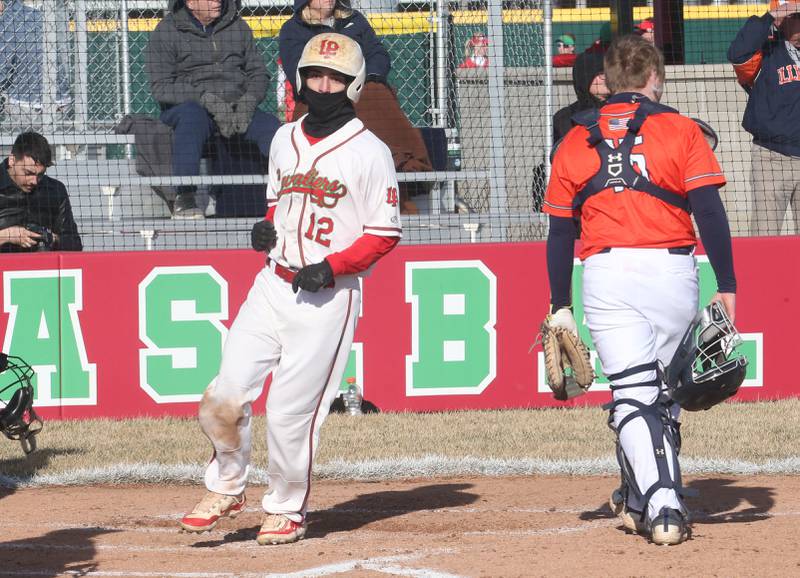L-P's Jentz Watson steps on home plate after scoring a run against Pontiac on Monday, March 24, 2025 at Huby Sarver Field inside the L-P Athletic Complex in La Salle.