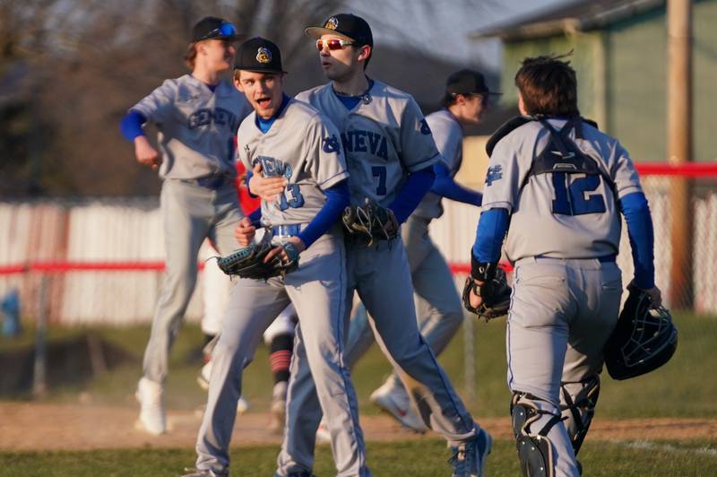 Geneva’s Seth Kisner (13) celebrates with his team after complete game victory over Yorkville during a baseball game at Yorkville High School on Thursday, March 21, 2024.