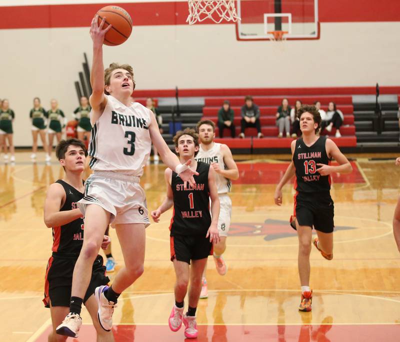 St. Bede's Alex Ankiewcz runs in the lane to score on a layup over Stillman Valley during the 49th annual Colmone Class on Thursday, Dec. 7, 2023 at Hall High School.