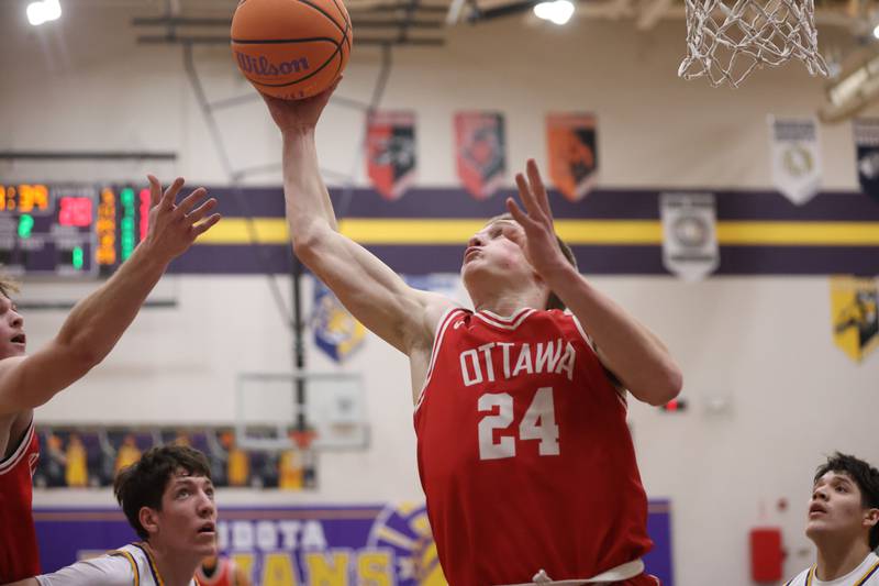 Ottawa's George Shumway grabs a rebound against Mendota on Tuesday, Jan. 6, 2026 at Mendota High School.