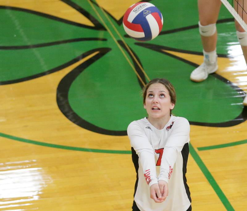 Henry's Lauren Harbison hits the ball toward the net against Putnam County in the Tri-County Conference Tournament on Monday, Oct. 10, 2022 in Seneca.