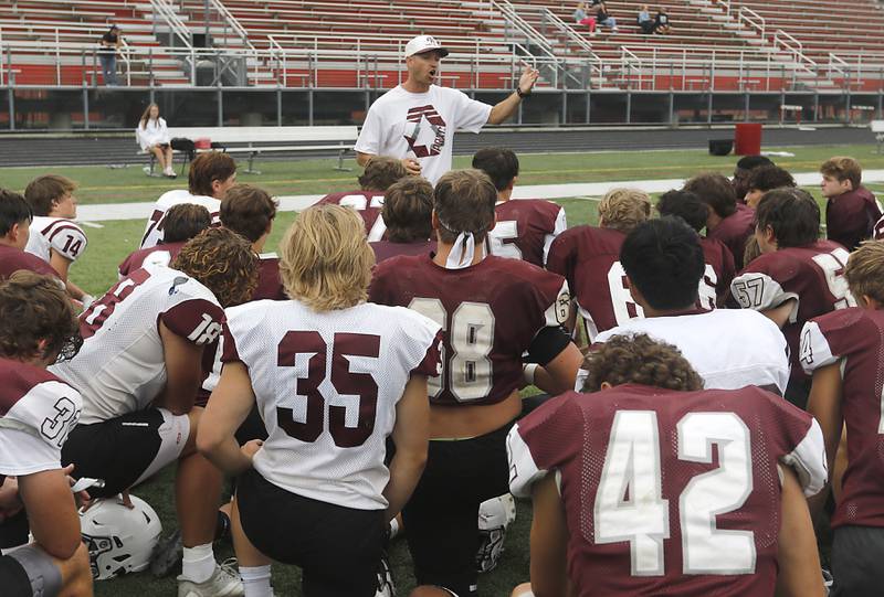 Prairie Ridge Head Coach Mike Frericks  talks to his team after football practice against Grant on Thursday, July 17, 2025, at Grant High School in Fox Lake.