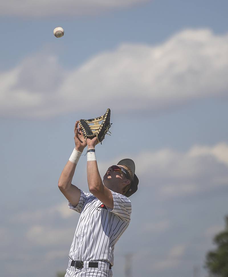 Fulton’s Jacob Huisenga camps under a pop-up against East Dubuque Wednesday, May 22, 2024 in the Class A sectional semifinal in Forreston.