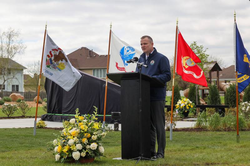 Kankakee County State's Attorney Jim Rowe speaks during the Gold Star Families Memorial Monument dedication ceremony at Marcotte Park in Bourbonnais on Saturday, April 26, 2025. The project was planned and fundraised for by 17-year-old Alexis McCullough, of Bourbonnais, for her Eagle Scout project in honor of her father, Col. Mark McCullough.