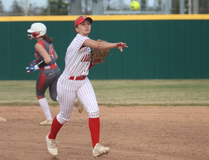 L-P's Sophie Pyszka throws to first to force out a Morton runner on Friday, March 20, 2026 at the L-P Athletic Complex in La Salle.