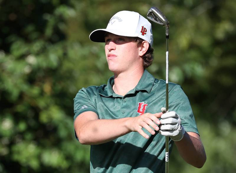 LaSalle-Peru’s Riley Cetwinski watches his tee shot on the par three fourth hole Monday, Sept. 23, 2024, during the Interstate 8 boys golf tournament at the Kishwaukee Country Club in DeKalb.