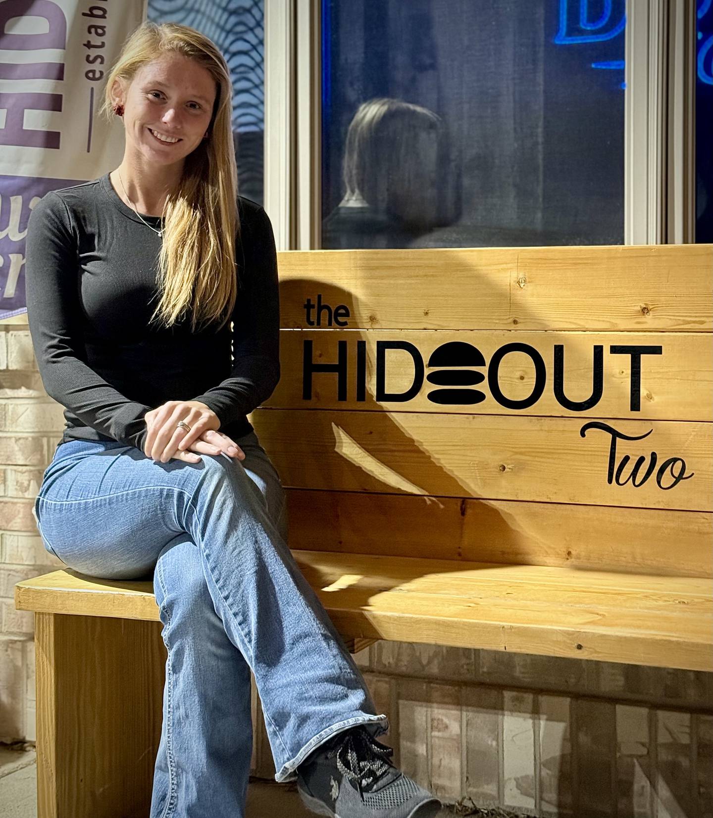 Newly returned after a deployment in Kuwait, Illinois Army National Guard Staff Sgt. Brooke Anderson of Morris is outside The Hideout Two, the newest restaurant she owns with her husband. 2024