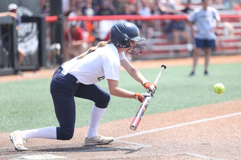 Lemont’s Nicole Pontrelli lays down a successful bunt to lead off the 12th inning against Antioch in the Class 3A state championship game on Saturday, June 10, 2023 in Peoria.
