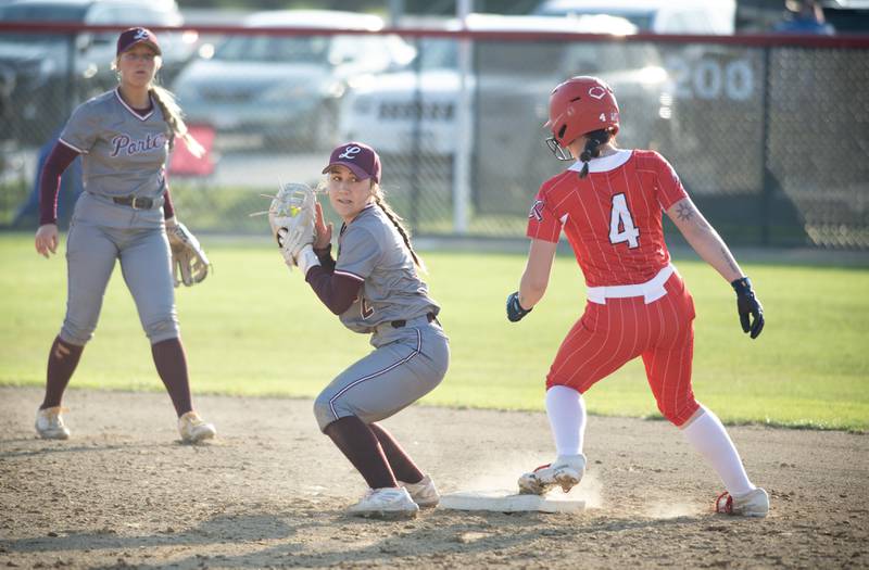 Lockport's Marie Baranowski, center, fields a late throw at second base as Bradley-Bourbonnais' Suttyn Hop, right, steps safely on the base in the fourth inning of Thursday's game.