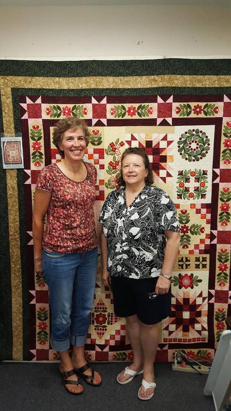 Lisa Flyte (left), owner of Creative Sewing Center, and Sally Ann Davis, owner of Aunt Sassy's Quilts, share their complementary businesses at 11 N. First St., Geneva. The two expanded their space this past spring as both businesses grew.