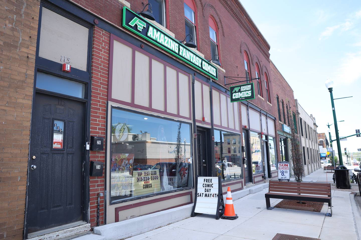 A sign for Free Comic Day sits outside Amazing Fantasy Comics on Wednesday, May 1, 2024 in downtown Lockport.