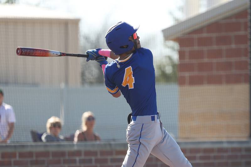 Joliet Central’s Andrew Nixon connects against Joliet West on Monday, April 15, 2024.