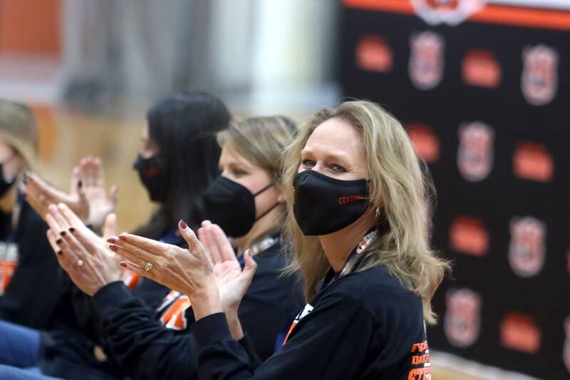 From right, Vice Principal Kim Bromley, Head Coach Elizabeth Lamb and Assistant Coach Alexa Kritikos participate as Crystal Lake Central held a celebration Sunday in their gymnasium after the Tigers on Saturday won the IHSA state title in Competitive Cheerleading-Medium Team at Grossinger Motors Arena in Bloomington.