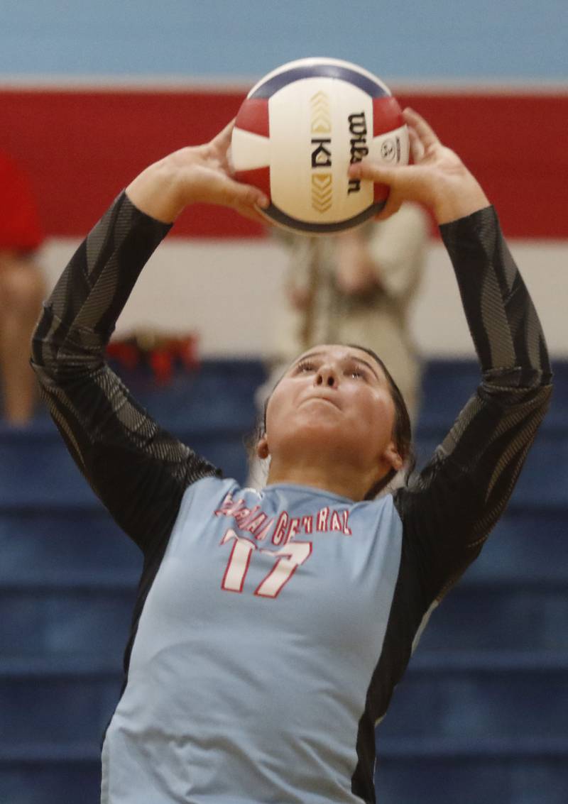 Marian Central's Alex Rewiako sets the ball during a nonconference volleyball match against McHenry Monday, Aug. 28, 2023, at Marian Central Catholic High School.