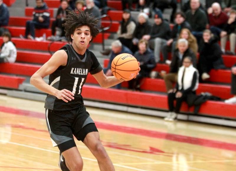 Kaneland's Evan Frieders drives toward the basket during a game against Naperville Central on Tuesday, Jan. 14, 2025 in Naperville.