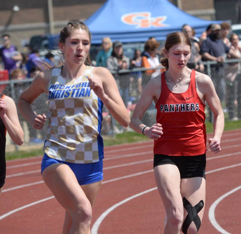 Erie-Prophetstown's Sarah Link (right) and Rockford Christian's Natalie Forward run the 800 meters at the Gebhardt-Worley Invitational at Oregon High School on Saturday, April 12, 2025. Link finished second in the event and Forward was third.