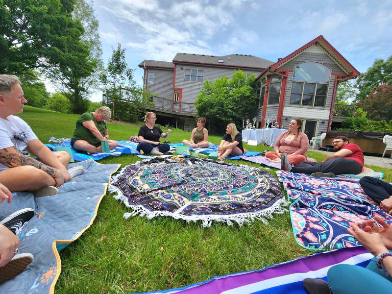 A group learns more about healing at Serenity Forest in Elgin.
