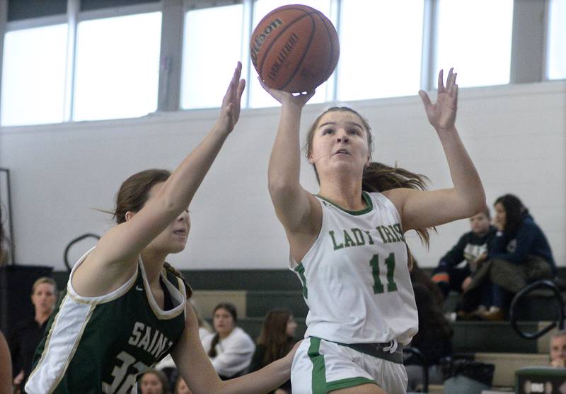 Seneca’s Cassia Buchanan gets a shot off past the St Bede defense to score in the fourth quarter Tuesday at St Bede.