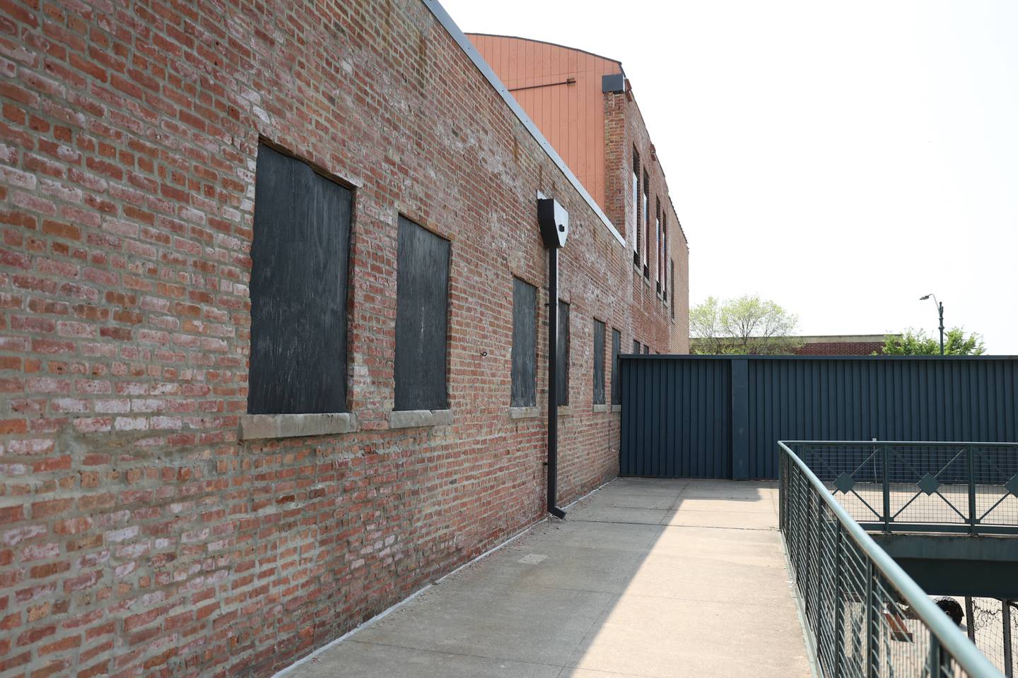 An old building sits adjacent to Duly Health and Care Stadium home of the Joliet Slammers baseball team. Tuesday, May 10, 2022, in Joliet.