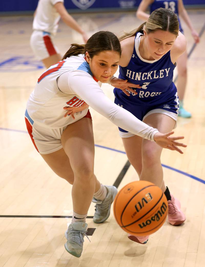 Marian Central's Julia Dovidio and Hinckley-Big Rock's Payton Murphy go after a loose ball Monday, Feb. 16, 2026, during their regional semifinal game at Hinckley-Big Rock High School.