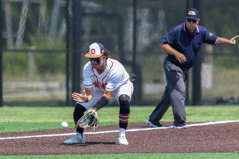 Oswego's Trey Hernandez (14) fields a hotshot to third during Class 4A Romeoville Sectional final game between Oswego East at Oswego.  June 3, 2023.