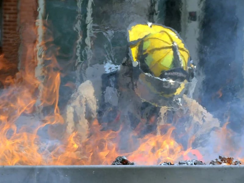 Firefighters, farmers team to extinguish corn field fire west of Manteno
