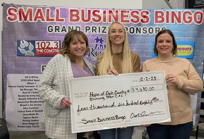 Small Business Bingo organizer Ashley Patrick (center) presents a check for $4,680 to representatives from HOPE of Ogle County and Shining Star Children's Advocacy Center.