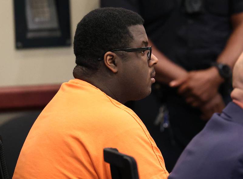 Timothy Doll, who pleaded guilty to murdering DeKalb High School freshman Gracie Sasso-Cleveland in 2023, listens to testimony Thursday, Aug. 14, 2025, during his sentencing hearing at the DeKalb County Courthouse in Sycamore. Doll was sentenced to 52 years in prison.