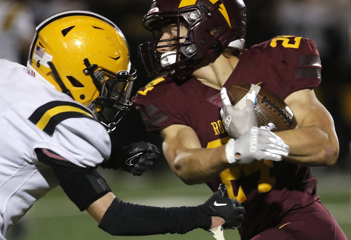 Richmond-Burton's Hunter Carley tries to get away from St. Laurence's Mickey Lotus during an IHSA Class 4A first-round football game on Friday, Nov. 1, 2024, at Richmond-Burton High School in Richmond.