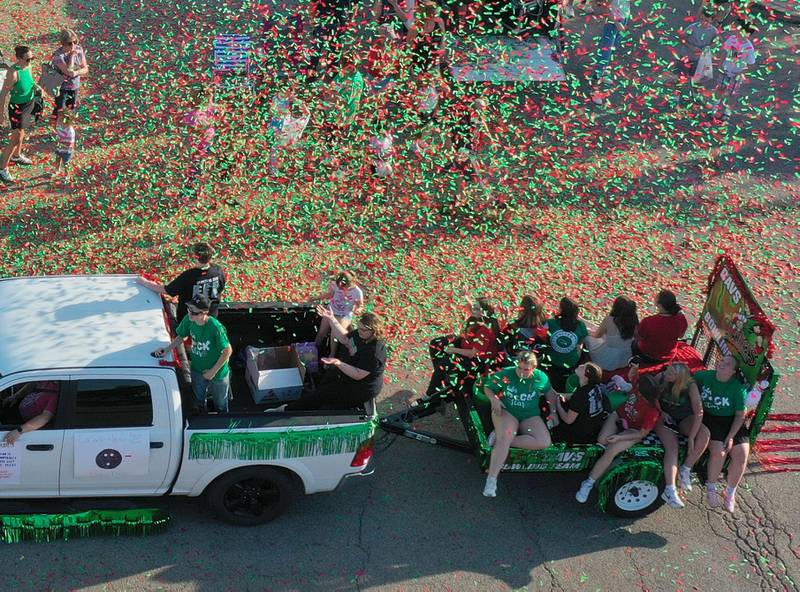 Confetti rains down on top of the L-P girls tennis team during the homecoming parade on Thuesday, Oct. 2, 2025 downtown La Salle.
