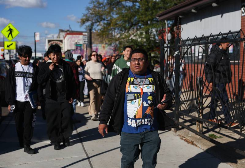 Baltazar Enriquez, president of the Little Village Community Council, walks with a Chicago Public School's student walkout in protest against U.S. Immigration and Customs Enforcement (ICE) agents around Chicago's Little Village neighborhood, Wednesday, Oct. 29, 2025. (AP Photo/Talia Sprague)