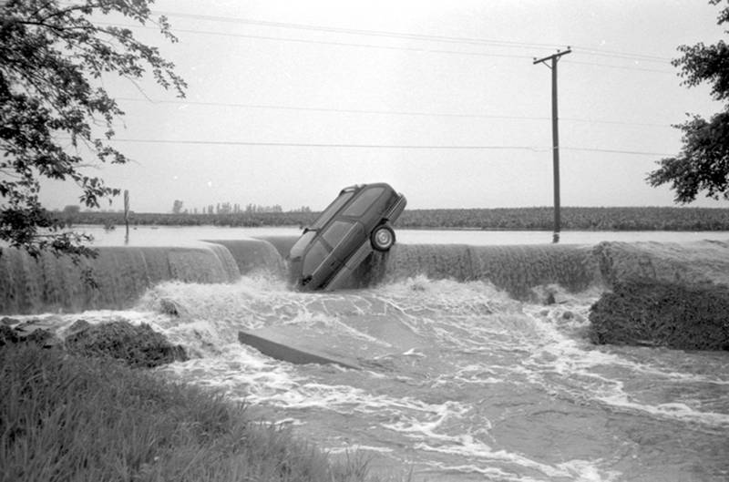 This Ford Taurus station wagon encountered a washed-out culvert on Douglas Road just south of Collins Road the night of July 17-18, 1996.