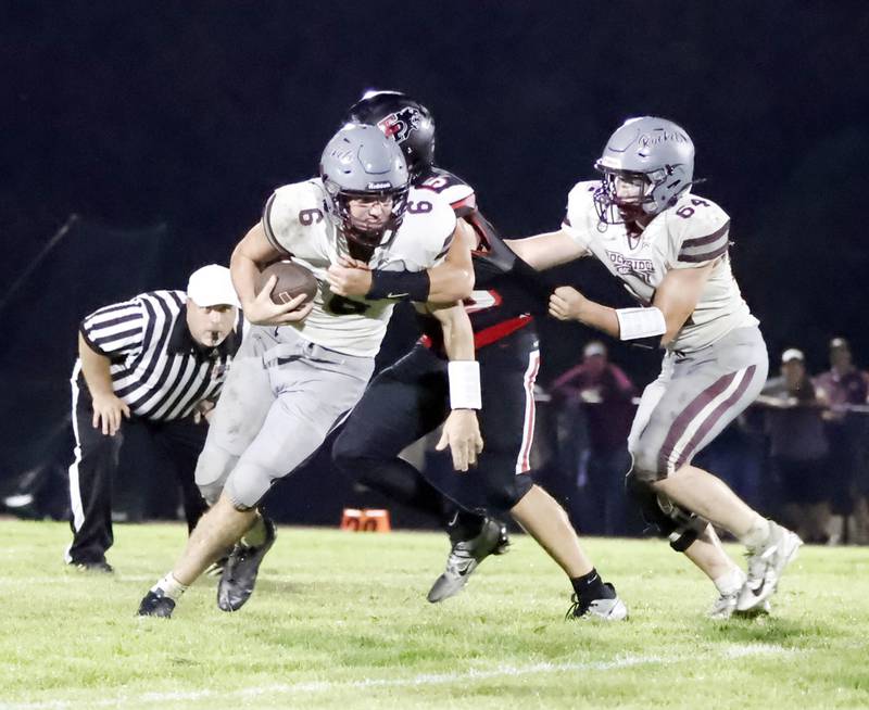During a conference game between the hosting EP Panthers and the visiting Rockridge Rockets on Friday night in Erie, Panthers #15 Evan Steimle pushed passed Rockets #64 Ryan Lower to sack quarterback #6 Cullen Schwigen. The Rockets took home another win, finishing the game 29-12. Leaving them 4-0 for the season and the Panthers 2-2 for the season.