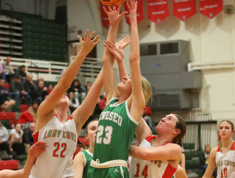 Geneseo's Kendall Ellerbrock grabs a rebound over L-P's Brianna Ruppert and Drew Depenbrock on Tuesday, Feb. 4, 2025 in AJ Sellett Gymnasium at L-P High School.