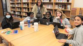 Literacy efforts spark love for reading in Troy students
