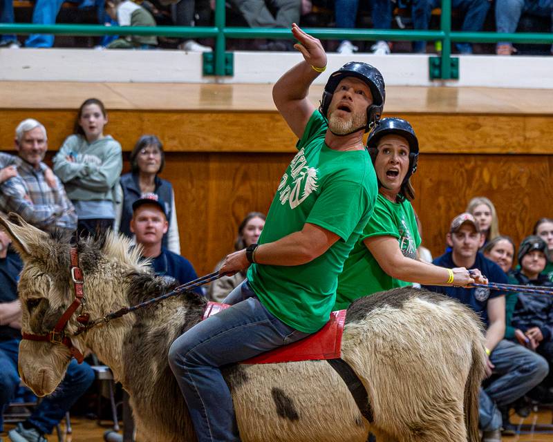 Seneca staff member shoots midrange shot in game of Donkey Basketball on Saturday, Feb. 7, 2026 at Seneca High School West Campus in Seneca.