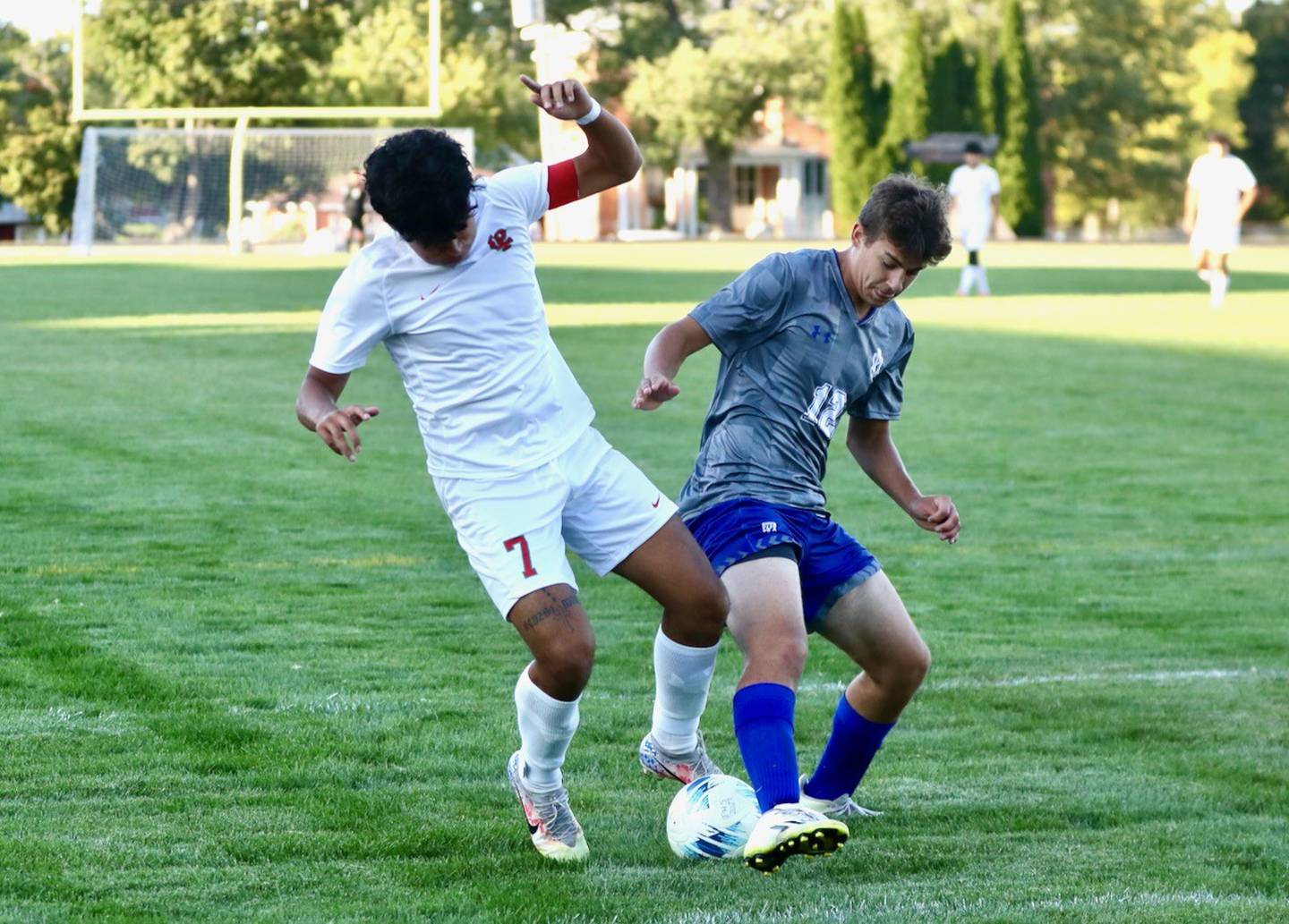 L-P's Brayan Gonzalez (left) and Princeton's Asa Gartin battle for the ball at the Bryant Field pitch Thursday night. Gonzalez scored a hat trick in the Cavs' 7-0 win.