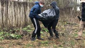 Lockport Township HS Junior ROTC cadets clean debris from Fairmont senior’s yard