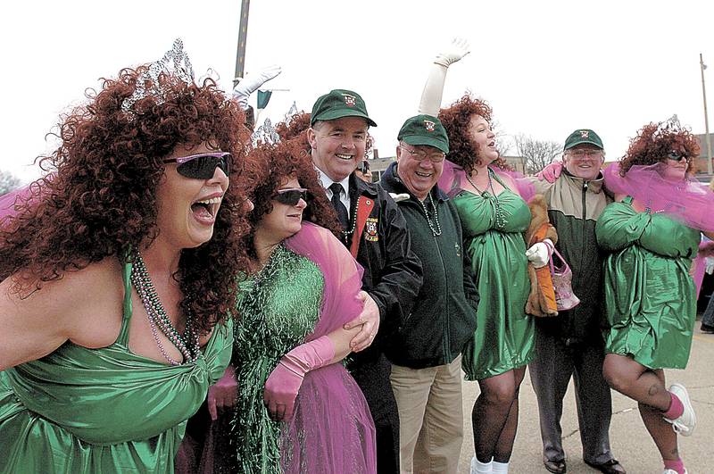 2005 File: Castlebar, Ireland Deputy Mayor Blackie Gavin (middle, left) and Dixon mayor Jim Burke get festive with the Lee County Sweet Potato Queens after the St. Patrick's Day parade in Dixon.