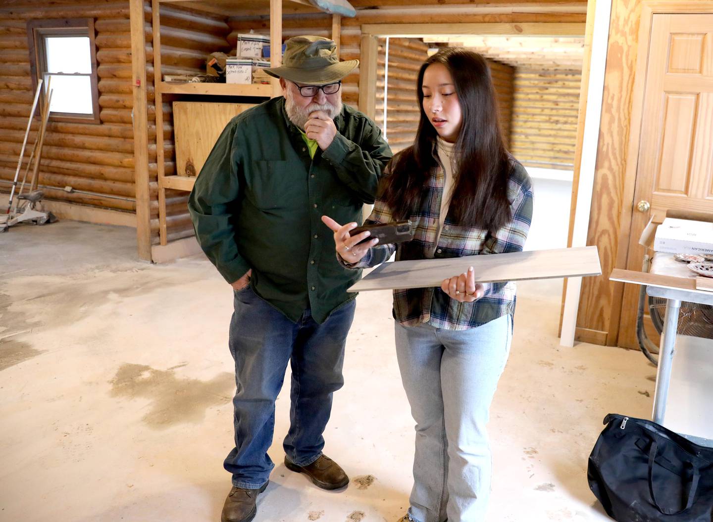 Kaneland High School junior Kaitlin Liu of Sugar Grove works with Charlie Qualls, chief property program officer for Girl Scouts of Northern Illinois at the Tech Camp GSNI  MakerSpace at Camp Dean in Big Rock that will feature robotics, 3D printers, embroiders, laser cutters, laptops, coding, Snap Circuits, rocketry and more. Kailtin is an Ambassador Girl Scout with Troop 1177.